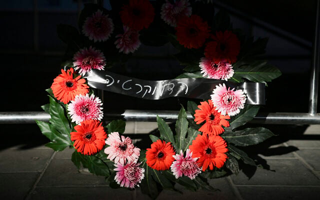A memorial wreath laid by the Democrats party at the site of the assassination of former prime minister Yitzhak Rabin in Rabin Square, Tel Aviv, during a ceremony marking the 31st anniversary of his assassination, October 22, 2026. (Miriam Alster/Flash90)