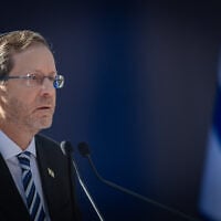 President Isaac Herzog speaks at a state memorial ceremony marking the 31st anniversary of the assassination of former prime minister Yitzhak Rabin at Mount Herzl Military Cemetery in Jerusalem, October 22, 2026. (Noam Revkin Fenton/Flash90)
