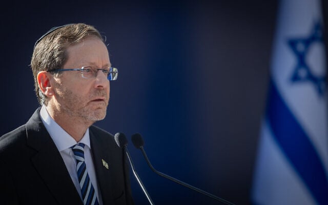 President Isaac Herzog speaks at a state memorial ceremony marking the 31st anniversary of the assassination of former prime minister Yitzhak Rabin at Mount Herzl Military Cemetery in Jerusalem, October 22, 2026. (Noam Revkin Fenton/Flash90)