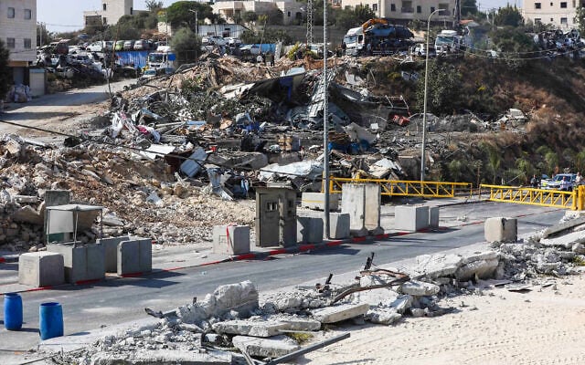 A view of the scene of a deadly shooting attack at the Yehuda Junction checkpoint near the West Bank city of Hebron, where two Israeli soldiers were killed and three others wounded by Palestinian gunmen the previous day, October 24, 2026. (Wisam Hashlamoun/Flash90) A view of the scene of a deadly shooting attack at the Yehuda Junction checkpoint near the West Bank city of Hebron, where two Israeli soldiers were killed and three others wounded by Palestinian gunmen the previous day, October 24, 2026. (Wisam Hashlamoun/Flash90)
