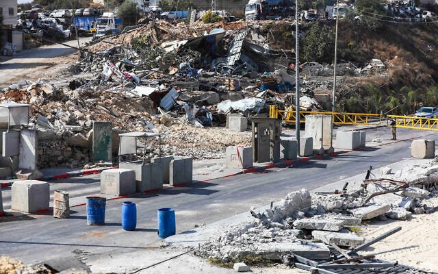 A view of the scene of a deadly shooting attack at the Yehuda Junction checkpoint near the West Bank city of Hebron, where two Israeli soldiers were murdered and three others wounded by Palestinian gunmen the previous day, October 24, 2026. (Wisam Hashlamoun/Flash90)