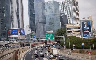Election campaign posters are seen along a highway in Tel Aviv, ahead of the national election, October 25, 2026. (Miriam Alster/FLASH90)
