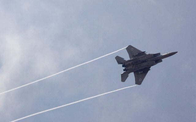 An Israeli fighter jet is seen in the skies over central Israel, October 25, 2026. (Nati Shohat/Flash90)