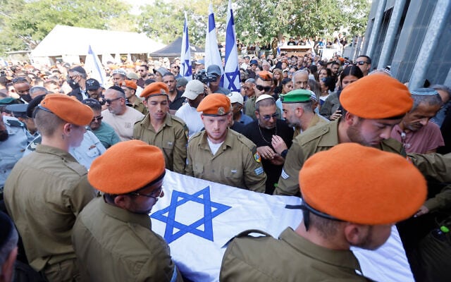 Family members, friends and mourners attend the funeral of Israeli soldier Sgt. Yuval Shai Svilem, 20, who was killed in a shooting attack near the West Bank city of Hebron on October 23, at the military cemetery in Hod Hasharon, October 25, 2026. (Tal Gal/Flash90) Family members, friends and mourners attend the funeral of Israeli soldier Sgt. Yuval Shai Svilem, 20, who was killed in a shooting attack near the West Bank city of Hebron on October 23, at the military cemetery in Hod Hasharon, October 25, 2026. (Tal Gal/Flash90)
