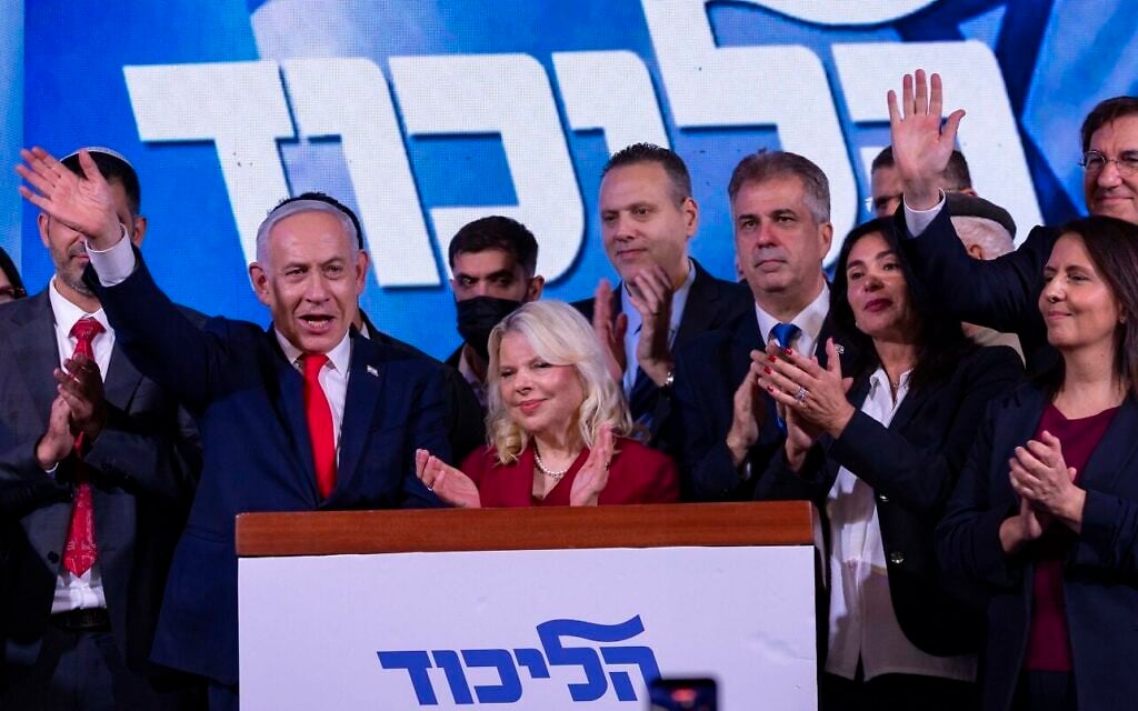 Prime Minister Benjamin Netanyahu, the Likud party chairman, waves at the Likud party’s election headquarters in Jerusalem, following the election, early October 28, 2026. (Chaim Goldberg/Flash90) Prime Minister Benjamin Netanyahu, the Likud party chairman, waves at the Likud party’s election headquarters in Jerusalem, following the election, early October 28, 2026. (Chaim Goldberg/Flash90)