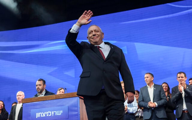 Yashar party leader Gadi Eisenkot waves to supporters after the release of the first exit poll results following the general election, in Tel Aviv on October 28, 2026. (Miriam Alster/Flash90)