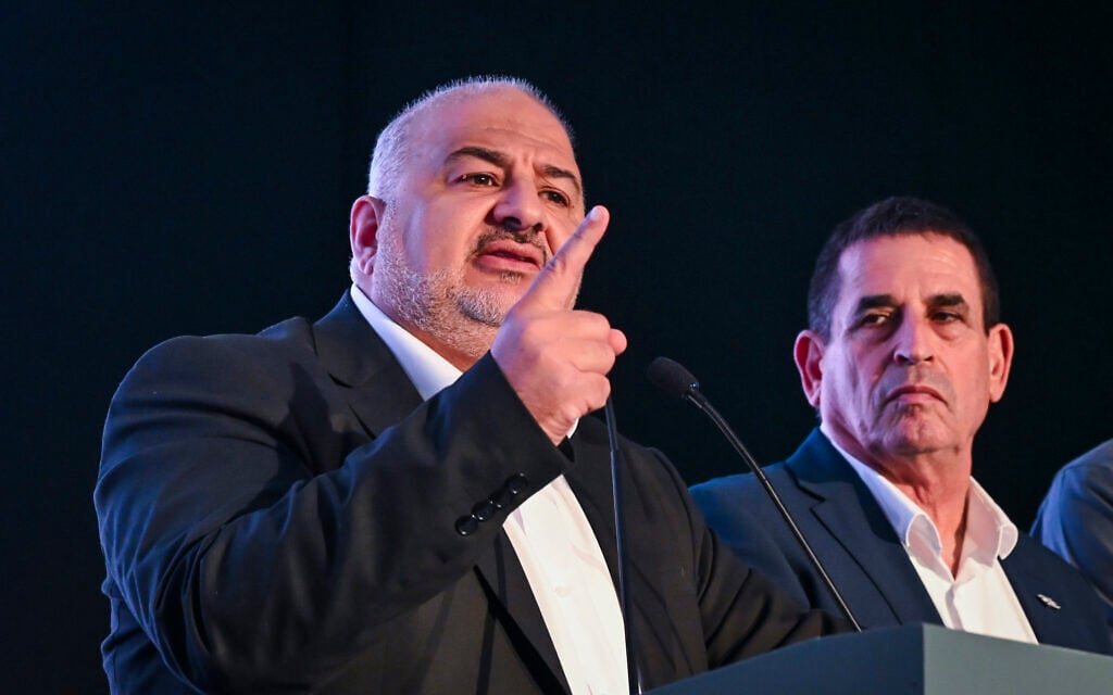 Ra'am party head Mansour Abbas, left, and No. 2 Yoav Segalovitz speak following the release of exit poll results on election night, in Sakhnin, October 27, 2026. (Michael Giladi/Flash90) Ra'am party head Mansour Abbas, left, and No. 2 Yoav Segalovitz speak following the release of exit poll results on election night, in Sakhnin, October 27, 2026. (Michael Giladi/Flash90)