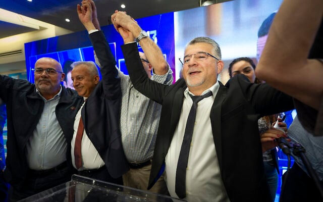 Joint List chair Yousef Jabareen and supporters gather at the party’s election headquarters in the northern Israeli city of Nazareth, following the closing of polling stations on Israel’s general election night, October 27, 2026. (Sharon Leibel/Flash90)