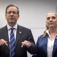 President Isaac Herzog and his wife Michal cast their ballots at a polling station in Jerusalem, during Election Day in Israel, October 27, 2026. (Yonatan Sindel/FLASH90)