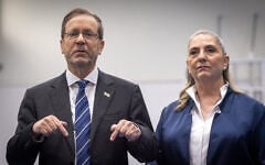President Isaac Herzog and his wife Michal cast their ballots at a polling station in Jerusalem, during Election Day in Israel, October 27, 2026. (Yonatan Sindel/FLASH90)