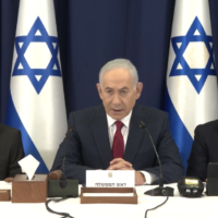 Prime Minister Benjamin Netanyahu (C) speaks at the start of a weekly cabinet meeting in Jerusalem, October 6, 2026. (GPO/Screenshot)