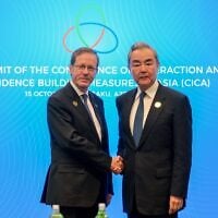 President Isaac Herzog (left) meets with Chinese Foreign Minister Wang Yi in Baku, October 16, 2026. (Isaac Herzog via X) President Isaac Herzog (left) meets with Chinese Foreign Minister Wang Yi in Baku, October 16, 2026. (Isaac Herzog via X)