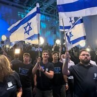 Activists celebrate at the Yashar party headquarters in Tel Aviv as exit polls show the opposition bloc winning more seats than Prime Minister Benjamin Netanyahu's bloc, on October 27, 2026. (Matan Siegel/Times of Israel)