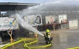 A firefighter works the scene of an explosion at the Intel factory in Kiryat Gat on October 14, 2026. (Fire and Rescue Service)