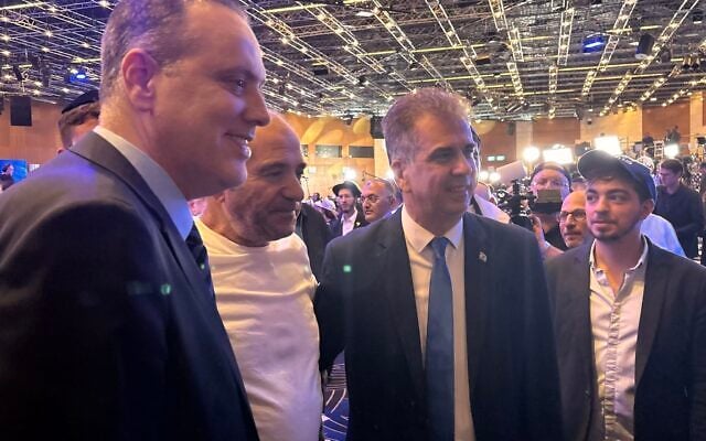 Likud ministers pose with supporters at the party's headquarters in Jerusalem on election night, October 28, 2026. (Lazar Berman/The Times of Israel) Likud ministers pose with supporters at the party's headquarters in Jerusalem on election night, October 28, 2026. (Lazar Berman/The Times of Israel)