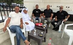 From left: Ahmed, Zen, and Bilal Al-Qassassi, Nimr Abu Schiban, and Einad Al-Qassassi; in Rahat, southern Israel, October 27, 2026. (Sue Surkes/Times of Israel)