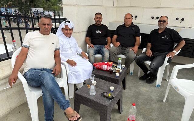 From left: Ahmed, Zen, and Bilal Al-Qassassi, Nimr Abu Schiban, and Einad Al-Qassassi; in Rahat, southern Israel, October 27, 2026. (Sue Surkes/Times of Israel)