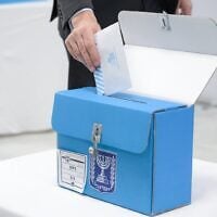Israeli Ambassador to Azerbaijan Ronen Kraus casts a ballot at the Israeli embassy in Baku as voting opens for diplomats abroad ahead of the October 27 election, on October 15, 2026. (Maayan Toaf/GPO)