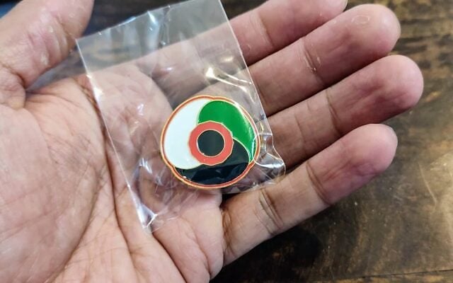 A "Palestine Poppy" badge being sold in Britain ahead of Remembrance Day, October 2026. (Palestine Poppy website)