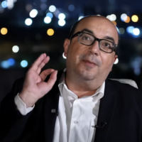 Balad party head Sami Abou Shahadeh gestures in a video statement published on October 2, 2026. (Screen capture: Facebook/Sami Abou Shahadeh)