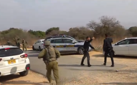 Security forces at the scene of a blast near the northern border that injured at least 12 hikers, including children, on October 12, 2026 (Channel 12 screenshot)