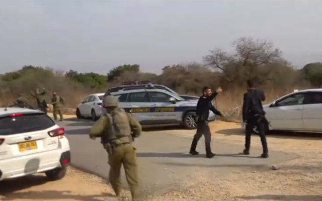 Security forces at the scene of a blast near the northern border that injured at least 12 hikers, including children, on October 12, 2026 (Channel 12 screenshot)