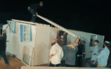People build a structure at the 'Pioneers of Gaza' settlement point in the Simhoni Forest in southern Israel, on the Strip's border, in a video published by the Nachala settlement movement on October 16, 2026. (Screen capture: X/Nachala)