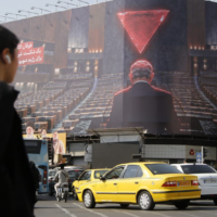 A giant anti-Israel and anti-Netanyahu billboard is displayed at Enghelab Square in Tehran as tensions between Iran and the United States and Israel continue, on October 12, 2026, in Tehran, Iran. The billboard depicts Prime Minister Benjamin Netanyahu addressing an empty hall and carries Persian messages reading, 'More isolated with each passing day' and 'Al-Aqsa Flood is a definite defeat for the Zionist regime.' (Fatemeh Bahrami/Anadolu via Getty Images, JTA)