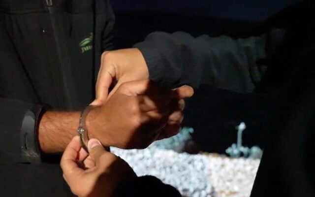 Police arresting a suspect in a settler attack in the West Bank, October 19, 2026. (Israel Police video screenshot)