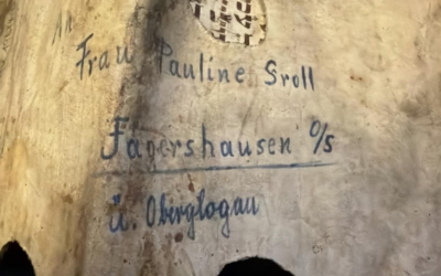 The reverse side of a Torah scroll fragment offered for auction in Norway, bearing a handwritten German address. The auction house claimed the parchment had been used by SS soldiers to wrap a package sent to Germany during the Holocaust. (Courtesy of RUTH: Remember Us The Holocaust, via JTA)
