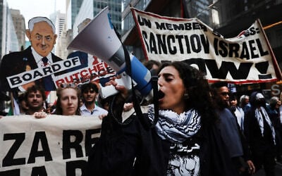 Protesters against Prime Minister Benjamin Netanyahu and his war in Gaza walk towards the United Nations in midtown Manhattan, New York, on September 24, 2026. (Spencer Platt/Getty Images via JTA)