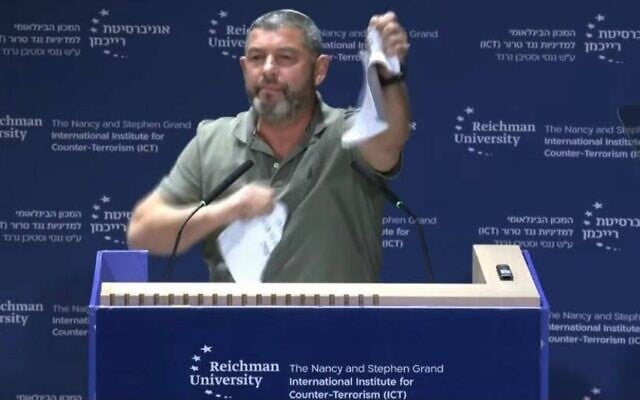 Ofer Winter tears up what he says is a copy of the Oslo Accords at the ICT conference at Reichman University on October 8, 2026 (People of Israel party) Ofer Winter tears up what he says is a copy of the Oslo Accords at the ICT conference at Reichman University on October 8, 2026 (People of Israel party)