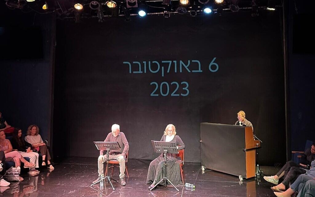 Moni Moshonov, left, and Sandra Sade, right, play ex-hostages Keith and Aviva Siegel during a reading at Habima National Theater on October 6, 2026 (Jessica Steinberg/Times of Israel) Moni Moshonov, left, and Sandra Sade, right, play ex-hostages Keith and Aviva Siegel during a reading at Habima National Theater on October 6, 2026 (Jessica Steinberg/Times of Israel)