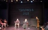 Moni Moshonov, left, and Sandra Sade, right, play ex-hostages Keith and Aviva Siegel during a reading at Habima National Theater on October 6, 2026 (Jessica Steinberg/Times of Israel)