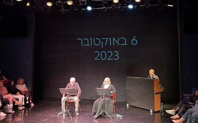 Moni Moshonov, left, and Sandra Sade, right, play ex-hostages Keith and Aviva Siegel during a reading at Habima National Theater on October 6, 2026 (Jessica Steinberg/Times of Israel) Moni Moshonov, left, and Sandra Sade, right, play ex-hostages Keith and Aviva Siegel during a reading at Habima National Theater on October 6, 2026 (Jessica Steinberg/Times of Israel)