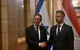 President Isaac Herzog (left) meets Hungarian Prime Minister Peter Magyar in Budapest on October 20, 2026. (Amos Ben Gershom/GPO)