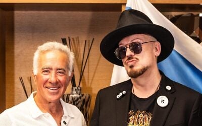 This handout photo shows Boy George, right, posing for a photo with Sylvan Adams as he arrives in Israel on October 31, 2026. (Alon Levin) This handout photo shows Boy George, right, posing for a photo with Sylvan Adams as he arrives in Israel on October 31, 2026. (Alon Levin)