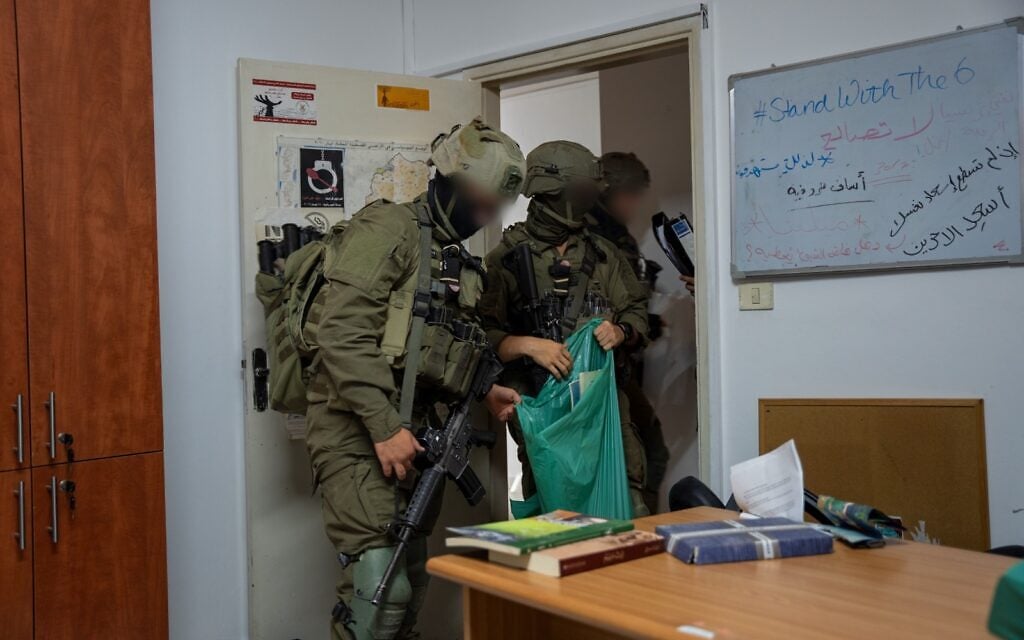 IDF soldiers with the 202nd Battalion take part in a raid of a West Bank charity office that was allegedly a terror front, in October 2026. (IDF) IDF soldiers with the 202nd Battalion take part in a raid of a West Bank charity office that was allegedly a terror front, in October 2026. (IDF)