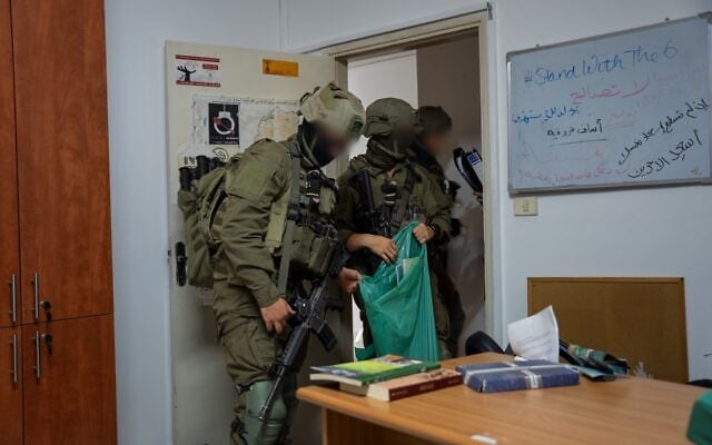 IDF soldiers with the 202nd Battalion take part in a raid of a West Bank charity office that was allegedly a terror front, in October 2026. (IDF) IDF soldiers with the 202nd Battalion take part in a raid of a West Bank charity office that was allegedly a terror front, in October 2026. (IDF)