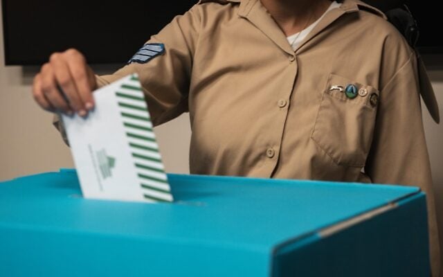 An Israeli Air Force soldier votes in Israel's national election at IAF headquarters in Tel Aviv, October 27, 2026. (Israel Defense Forces)