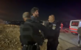 Activist-journalist Jasper Nathaniel arrested by Israeli police in the South Hebron Hills, West Bank, overnight October 28, 2026, following a confrontation with settlers. (Adele Shoko/X)