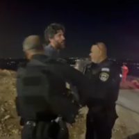 Activist-journalist Jasper Nathaniel arrested by Israeli police in the South Hebron Hills, West Bank, overnight October 28, 2026, following a confrontation with settlers. (Adele Shoko/X)