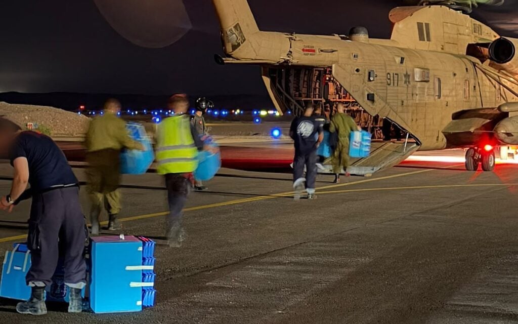 Military ballot boxes are loaded onto an Israeli Air Force helicopter in southern Israel, late October 27, 2026. (Israel Defense Forces)