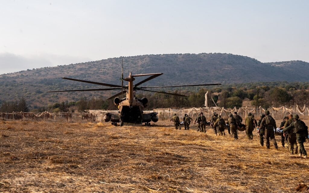 IDF soldiers and a helicopter at the scene of a deadly explosion of an unexploded Hezbollah ordnance during a school hike in the Ramim Ridge area in northern Israel, close to the border with Lebanon, October 12, 2026. (Israel Defense Forces) IDF soldiers and a helicopter at the scene of a deadly explosion of an unexploded Hezbollah ordnance during a school hike in the Ramim Ridge area in northern Israel, close to the border with Lebanon, October 12, 2026. (Israel Defense Forces)