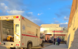An ambulance outside an emergency department in Edmonton, Alberta, on October 18, 2026, as hospitals received patients following a deadly incident at Canadian Forces Base Wainwright.(Screen capture via X/@DD_Geopolitics)