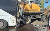 A bus and tractor are seen after a crash on Route 25 in southern Israel on October 30, 2026. (Magen David Adom)