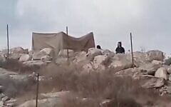 A tent set up by extremist settlers blocks a home in Wadi Rahim, in the West Bank, October 6, 2026. (Courtesy)