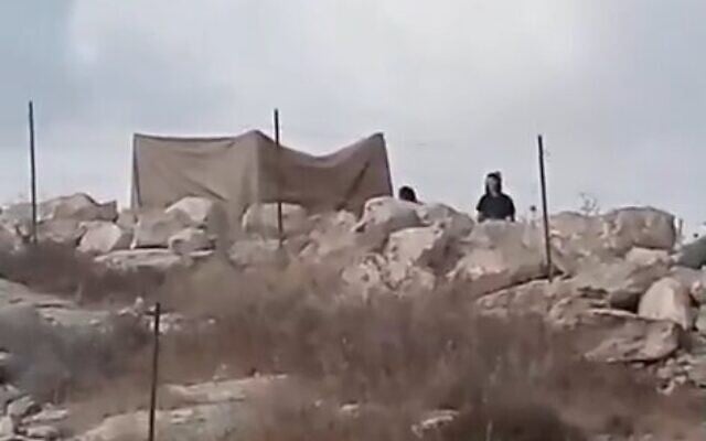 A tent set up by extremist settlers blocks a home in Wadi Rahim, in the West Bank, October 6, 2026. (Courtesy)