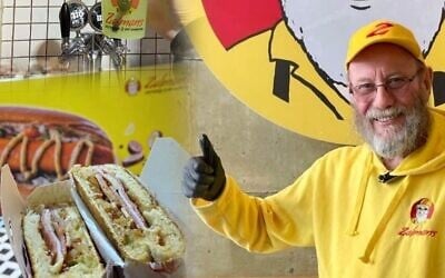Zalman's founder Moshe Zalman Olive at one of his hot dog restaurants (Courtesy)